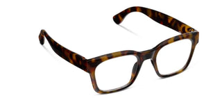 Three-quarter angled studio view of Peepers "Boone" reading glasses set against a clean white background. The bold full-rim acrylic frames feature a timeless dark tortoise shell pattern with warm amber and brown mottled tones. Designed with a structured square silhouette, keyhole bridge detail, clear lenses, flexible spring hinges, and thick, contoured temple arms with curved tips for a comfortable, classic fit.