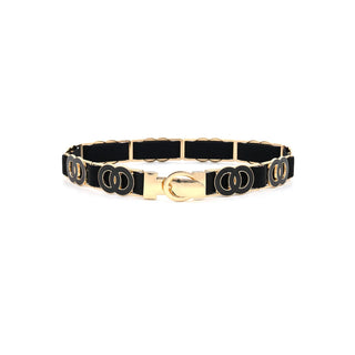 Front view of an elegant black and gold-tone stretch belt set against a crisp white background. The accessory features a structured black elastic band adorned with a continuous pattern of interlocking black oval motifs, each outlined in polished gold-tone metal. The belt centers on a smooth, solid gold-tone hook buckle clasp closure, combining modern geometric design with functional, comfortable wear.