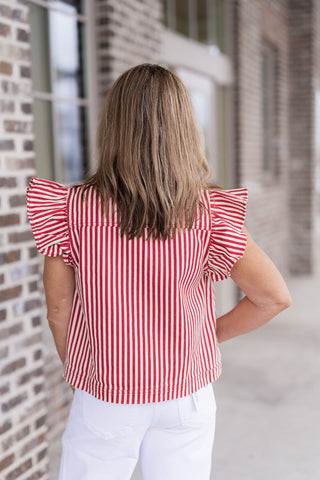 Rear view of the Regatta Ruffle Vest emphasizing the voluminous, layered ruffle sleeves and the clean, vertical lines of the red and white nautical stripes. The vest sits at the natural waistline, providing a tailored and polished silhouette.