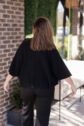 Film Curator Poncho Top