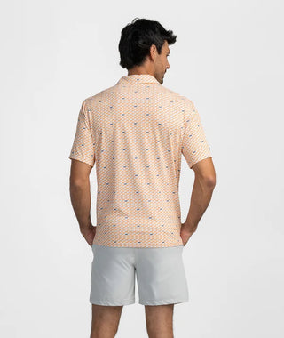 Back view of the Touchdown In Tennessee Polo showing the athletic, classic fit and short sleeves. The continuous state silhouette pattern extends across the back, paired with light grey shorts against a plain white studio background.